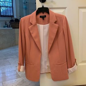 Pink blazer. Awesome for spring! Beautiful color, and only worn once!